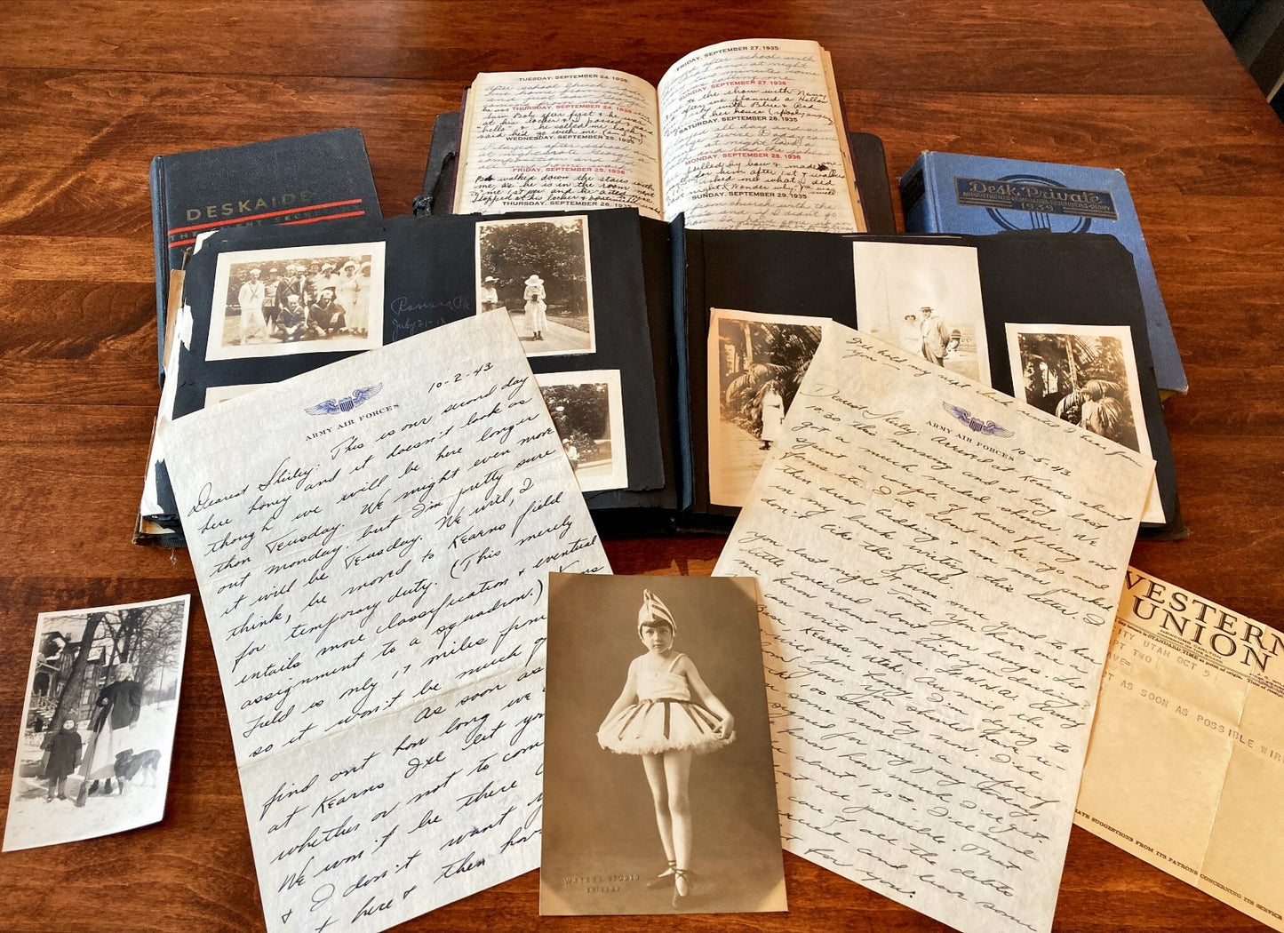 Letters, diaries, photo album, photographs, and telegrams.